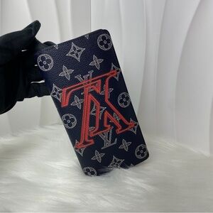 LOUIS VUITTON Limited Edition Reverse Monogram Zip Around Wallet Navy